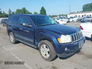 2005 Jeep Grand Cherokee Laredo with VIN 1J4HR48N45C605543, listed as a IAAI auction lot 42612473 with 158,456 mi miles and . Bid and sale history available at DreamBid. Image 1.