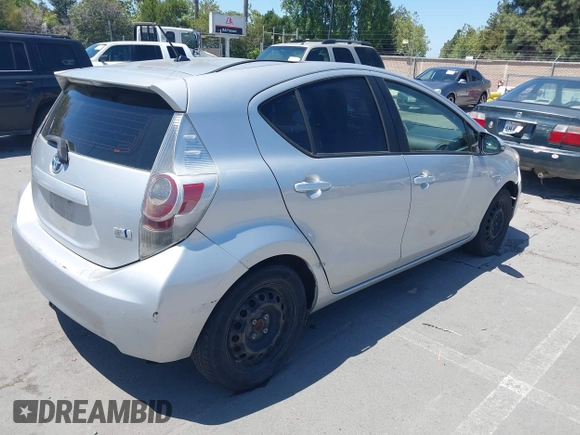 2014 Toyota Prius One with VIN JTDKDTB38E1061202, listed as a IAAI auction lot 42044747 with 133,409 mi miles and . Bid and sale history available at DreamBid. Image 4.