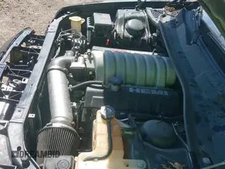 2006 Chrysler 300 C SRT-8 with VIN 2C3KA73W56H332748, listed as a IAAI auction lot 43292460 with 168,014 mi miles and . Bid and sale history available at DreamBid. Image 19.