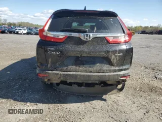 2018 Honda CR-V EX with VIN 7FARW2H54JE012712, listed as a Copart auction lot 52256715 with 69,767 mi miles and Salvage Title. Bid and sale history available at DreamBid. Image 6.