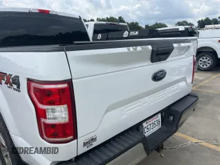 2018 Ford F-150 XL with VIN 1FTEW1E53JKC80985, listed as a IAAI auction lot 42568687 with 97,179 mi miles and . Bid and sale history available at DreamBid. Image 1.