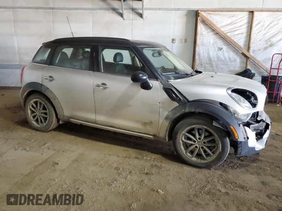 2016 MINI Countryman S with VIN WMWZC5C5XGWU03443, listed as a Copart auction lot 48915215 with 105,030 mi miles and Salvage Title. Bid and sale history available at DreamBid. Image 4.