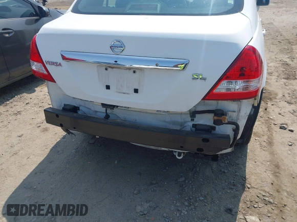 2010 Nissan Versa S with VIN 3N1BC1AP1AL420360, listed as a IAAI auction lot 42404492 with 121,897 mi miles and . Bid and sale history available at DreamBid. Image 6.