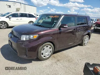2012 Scion xB with VIN JTLZE4FE7CJ004570, listed as a Copart auction lot 53264915 with 216,080 mi miles and Salvage Title. Bid and sale history available at carsss.com. Image 1.