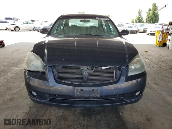 2005 Nissan Altima 2.5 with VIN 1N4AL11D45C155651, listed as a Copart auction lot 56910945 with 115,877 mi miles and Salvage title. Bid and sale history available at DreamBid. Image 5.