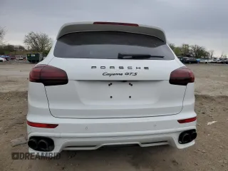 2016 Porsche Cayenne GTS z VIN WP1AD2A27GLA76651, wystawiony jako Copart lot #52693515 z przebiegiem 86 235 mil mil oraz Tytuł czysty. Historia ofert i sprzedaży dostępna na DreamBid. Obrazek 6.