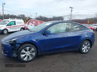 2023 Tesla Model Y Long Range z VIN 7SAYGDEE2PF694974, wystawiony jako IAAI lot #41814582 z przebiegiem 31 726 mil mil oraz . Historia ofert i sprzedaży dostępna na DreamBid. Obrazek 19.