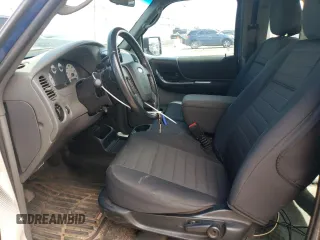 2011 Ford Ranger XLT with VIN 1FTLR4FE9BPA97870, listed as a Copart auction lot 60725915 with 148,338 mi miles and Salvage title. Bid and sale history available at DreamBid. Image 7.