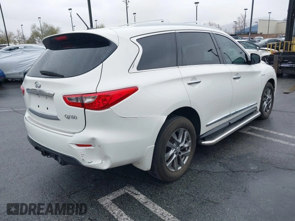 2014 Infiniti QX60 Hybrid with VIN 5N1CL0MM6EC519749, listed as a IAAI auction lot 41470769 with 153,766 mi miles and . Bid and sale history available at DreamBid. Image 4.