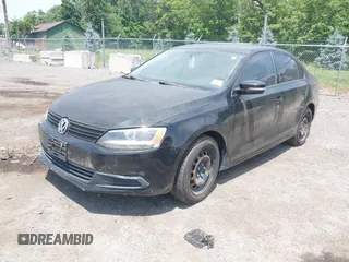 2014 Volkswagen Jetta SE with VIN 3VWD17AJ2EM392821, listed as a IAAI auction lot 42621085 with 102,211 mi miles and . Bid and sale history available at DreamBid. Image 2.