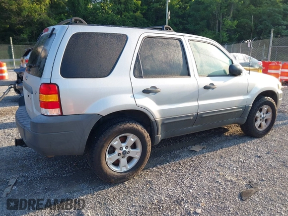 2006 Ford Escape XLT with VIN 1FMYU93156KD26045, listed as a IAAI auction lot 42503718 with 141,738 mi miles and . Bid and sale history available at DreamBid. Image 4.