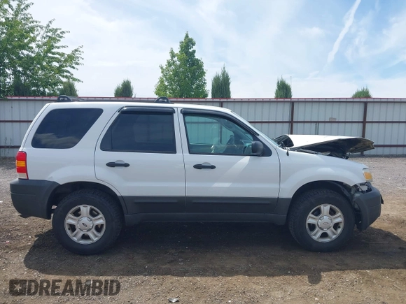 2006 Ford Escape XLT with VIN 1FMCU93106KA36063, listed as a IAAI auction lot 42610043 with 193,703 mi miles and . Bid and sale history available at DreamBid. Image 13.