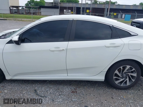 2018 Honda Civic LX with VIN 2HGFC2F59JH576975, listed as a IAAI auction lot 42098020 with 89,791 mi miles and . Bid and sale history available at DreamBid. Image 15.