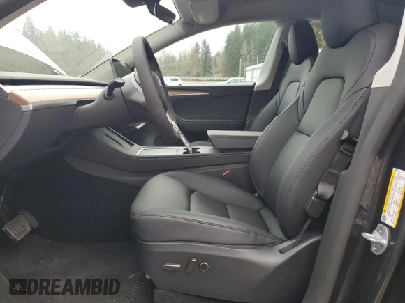 2025 Tesla Model Y Long Range with VIN 7SAYGDEE5SF296652, listed as a Copart auction lot 46664465 with 452 mi miles and Salvage Title. Bid and sale history available at DreamBid. Image 7.