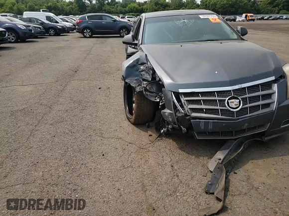 2011 Cadillac CTS Premium z VIN 1G6DS5ED1B0154694, wystawiony jako Copart lot #59187255 z przebiegiem Nie podano mil oraz Szkoda całkowita • Salvage title. Historia ofert i sprzedaży dostępna na DreamBid. Obrazek 13.