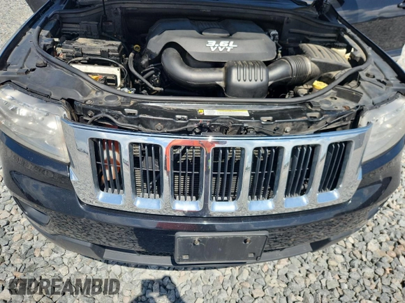 2013 Jeep Grand Cherokee Laredo с VIN 1C4RJFAG6DC626384, выставлен на аукционе Copart как лот 61274045 с пробегом 239 938 миль миль и Чистый • Clean title. История ставок и продаж доступна на DreamBid. Изображение 12.
