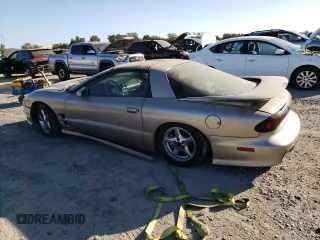 1999 Pontiac Firebird Formula with VIN 2G2FV22G3X2206170, listed as a Copart auction lot 74780914 with Not provided miles and Salvage title. Bid and sale history available at DreamBid. Image 2.