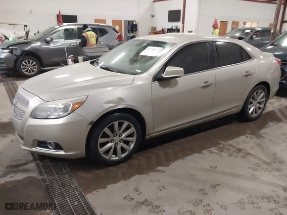 2013 Chevrolet Malibu LTZ with VIN 1G11H5SAXDF236151, listed as a IAAI auction lot 41720812 with 181,159 mi miles. Bid and sale history available at carsss.com. Image 2.