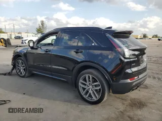 2019 Cadillac XT4 AWD Sport z VIN 1GYFZFR48KF100558, wystawiony jako Copart lot #48112045 z przebiegiem 63 689 mil mil oraz Nie do naprawy • Non repairable. Historia ofert i sprzedaży dostępna na DreamBid. Obrazek 2.