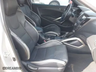 2016 Hyundai Veloster Turbo with VIN KMHTC6AE3GU263387, listed as a IAAI auction lot 42040177 with 96,864 mi miles. Bid and sale history available at carsss.com. Image 5.