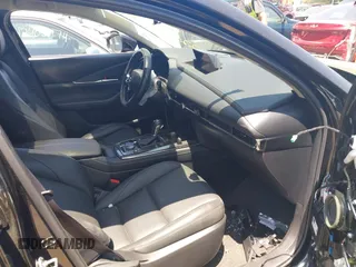 2022 Mazda CX-30 S Carbon Edition with VIN 3MVDMBCL3NM440188, listed as a IAAI auction lot 42259723 with 48,555 mi miles and . Bid and sale history available at DreamBid. Image 5.