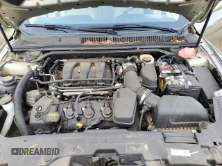 2013 Ford Taurus Limited z VIN 1FAHP2F84DG233065, wystawiony jako Copart lot #60356025 z przebiegiem 37 362 mil mil oraz Szkoda całkowita • Salvage title. Historia ofert i sprzedaży dostępna na DreamBid. Obrazek 11.