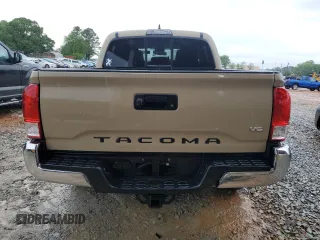 2017 Toyota Tacoma SR5 with VIN 5TFAZ5CN2HX030781, listed as a Copart auction lot 53957535 with 105,606 mi miles and Salvage Title. Bid and sale history available at DreamBid. Image 6.