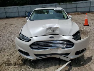 2015 Ford Fusion SE Hybrid with VIN 3FA6P0LU1FR210884, listed as a Copart auction lot 60035595 with 125,798 mi miles and Salvage title. Bid and sale history available at DreamBid. Image 5.
