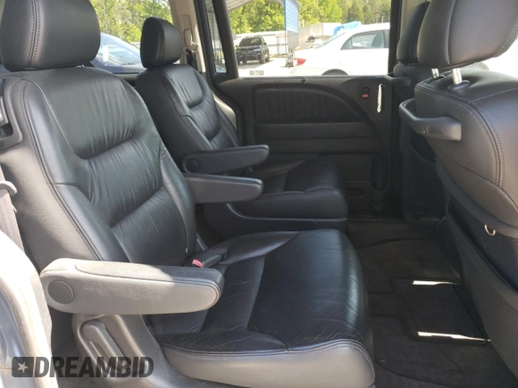 2006 Honda Odyssey Touring z VIN 5FNRL388X6B009356, wystawiony jako Copart lot #55991335 z przebiegiem 101 816 mil mil oraz Szkoda całkowita • Salvage title. Historia ofert i sprzedaży dostępna na DreamBid. Obrazek 10.