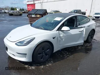 2021 Tesla Model 3 Standard Range Plus z VIN 5YJ3E1EA5MF977437, wystawiony jako IAAI lot #40297512 z przebiegiem 72 039 mil mil oraz . Historia ofert i sprzedaży dostępna na DreamBid. Obrazek 22.