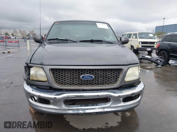 2003 Ford F-150 XL with VIN 1FTRX17W03NB51687, listed as a IAAI auction lot 41712022 with 183,428 mi miles. Bid and sale history available at carsss.com. Image 12.