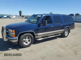 1999 Chevrolet Suburban with VIN 1GNEC16R1XJ394144, listed as a Copart auction lot 50418185 with 173,037 mi miles and Salvage title. Bid and sale history available at DreamBid. Image 1.