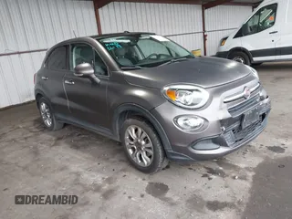 2016 FIAT 500X Easy z VIN ZFBCFXBTXGP349005, wystawiony jako IAAI lot #41163593 z przebiegiem 69 012 mil mil oraz . Historia ofert i sprzedaży dostępna na DreamBid. Obrazek 1.