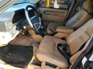 1992 Volvo 960 z VIN YV1KW9510N0005570, wystawiony jako Copart lot #70897964 z przebiegiem 254 533 mil mil oraz Szkody całkowita. Historia ofert i sprzedaży dostępna na DreamBid. Obrazek 7.