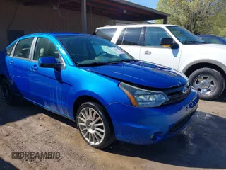 2010 Ford Focus SES with VIN 1FAHP3GN8AW165221, listed as a IAAI auction lot 41864224 with 148,785 mi miles. Bid and sale history available at carsss.com. Image 1.