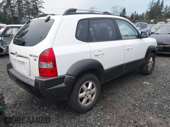 2005 Hyundai Tucson GLS with VIN KM8JN72D75U060416, listed as a IAAI auction lot 41212714 with 173,421 mi miles. Bid and sale history available at carsss.com. Image 4.