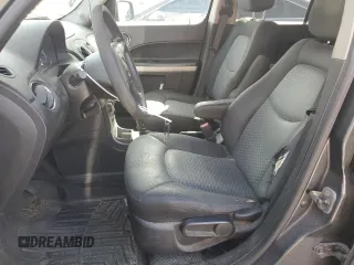 2010 Chevrolet HHR LS with VIN 3GNBAADB2AS582577, listed as a Copart auction lot 52772525 with 159,673 mi miles and Clean Title. Bid and sale history available at DreamBid. Image 7.