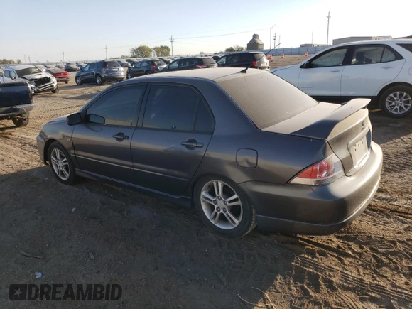 2005 Mitsubishi Lancer with VIN JA3AJ66F25U016375, listed as a Copart auction lot 73584514 with 202,752 mi miles and Clean Title. Bid and sale history available at DreamBid. Image 2.