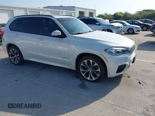 2014 BMW X5 xDrive50i with VIN 5UXKR6C58E0J73067, listed as a IAAI auction lot 41857522 with 111,340 mi miles. Bid and sale history available at carsss.com. Image 1.