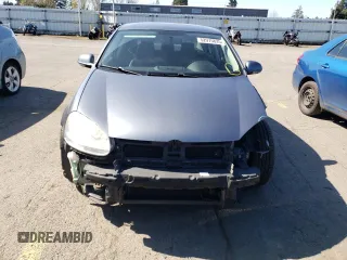 2010 Volkswagen Jetta SE z VIN 3VWRX7AJ4AM129714, wystawiony jako Copart lot #52975835 z przebiegiem 166 554 mil mil oraz Szkoda całkowita • Salvage title. Historia ofert i sprzedaży dostępna na DreamBid. Obrazek 5.