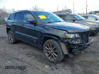 2016 Jeep Grand Cherokee Limited z VIN 1C4RJFBG6GC411557, wystawiony jako IAAI lot #41895874 z przebiegiem 163 051 mil mil oraz . Historia ofert i sprzedaży dostępna na DreamBid. Obrazek 1.