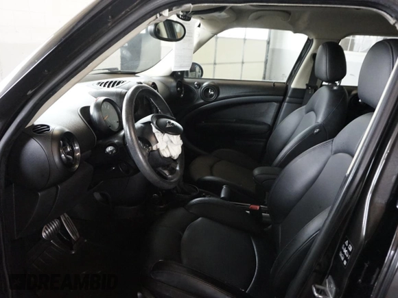2016 MINI Countryman S with VIN WMWZC5C55GWU00997, listed as a Copart auction lot 58840965 with 41,217 mi miles and Salvage title. Bid and sale history available at DreamBid. Image 9.