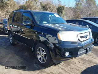 2010 Honda Pilot Touring with VIN 5FNYF4H95AB030531, listed as a IAAI auction lot 41441088 with 274,185 mi miles and . Bid and sale history available at carsss.com. Image 1.