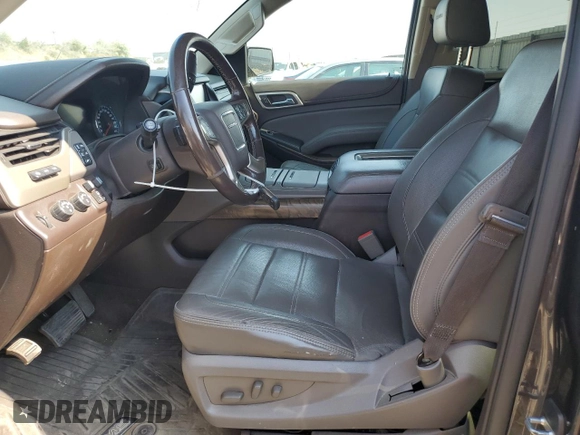 2018 GMC Yukon Denali with VIN 1GKS2CKJXJR217857, listed as a Copart auction lot 62943934 with 122,015 mi miles and Salvage Title. Bid and sale history available at carsss.com. Image 7.