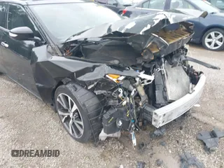 2016 Nissan Maxima Platinum with VIN 1N4AA6AP0GC903120, listed as a IAAI auction lot 42364799 with 166,505 mi miles and . Bid and sale history available at DreamBid. Image 18.