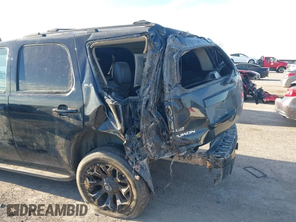 2014 GMC Yukon SLT with VIN 1GKS1CE00ER247249, listed as a IAAI auction lot 41271351 with 215,044 mi miles. Bid and sale history available at carsss.com. Image 6.