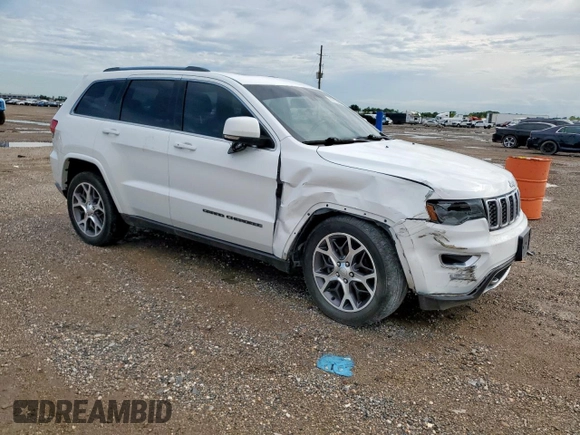 2018 Jeep Grand Cherokee Sterling z VIN 1C4RJEBG4JC322703, wystawiony jako Copart lot #60742505 z przebiegiem 110 621 mil mil oraz Szkoda całkowita • Salvage title. Historia ofert i sprzedaży dostępna na DreamBid. Obrazek 4.
