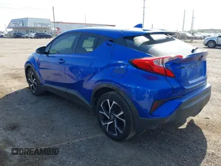 2018 Toyota C-HR XLE z VIN NMTKHMBX7JR004448, wystawiony jako IAAI lot #42785933 z przebiegiem 112 115 mil mil oraz . Historia ofert i sprzedaży dostępna na DreamBid. Obrazek 3.