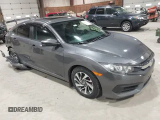 2017 Honda Civic EX z VIN 19XFC2F75HE214261, wystawiony jako IAAI lot #42043946 z przebiegiem 172 184 mil mil oraz . Historia ofert i sprzedaży dostępna na DreamBid. Obrazek 1.