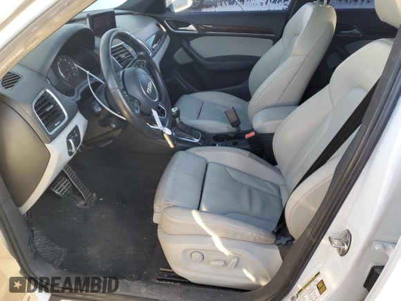 2015 Audi Q3 2.0T Prestige with VIN WA1GFCFS6FR014202, listed as a Copart auction lot 88934125 with 180,082 mi miles and Clean Title. Bid and sale history available at carsss.com. Image 7.